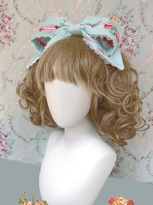 Mint green sweet lolita bow headdress featuring strawberry print pattern and white lace trim, three-quarter view on mannequin, classic lolita hair accessory with rococo inspiration