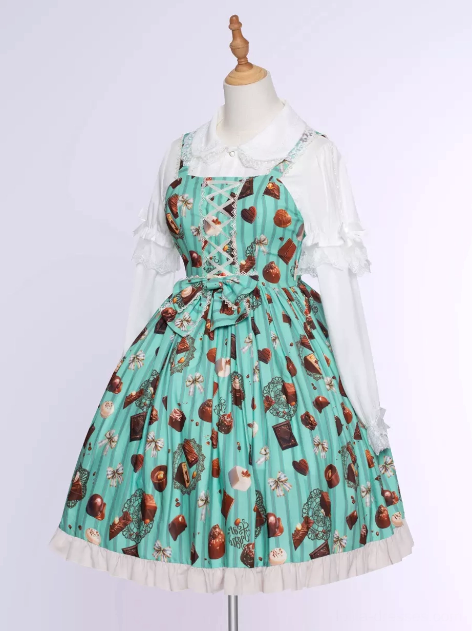 Mint green chocolate cake print sweet Lolita JSK dress detail close-up showing print quality and ruffled hemline embellishment