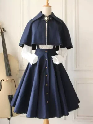 Navy blue gothic lolita military cape with black lace trim and vintage metal buttons front view on dress form