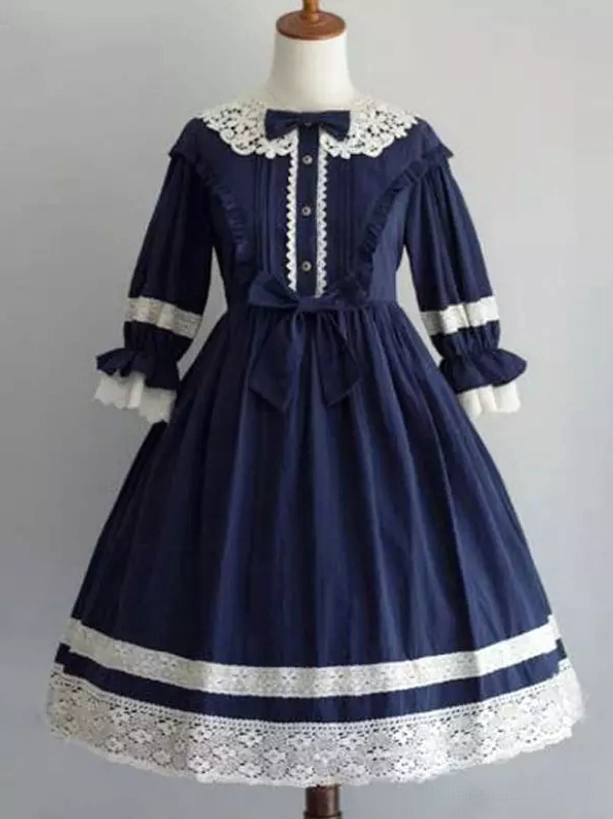 Navy blue lolita OP dress with white lace collar large waist bow and hem lace trim details