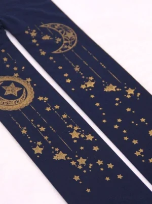 Navy blue velvet lolita pantyhose featuring golden moon crescent star celestial prints flat lay close-up detail shot