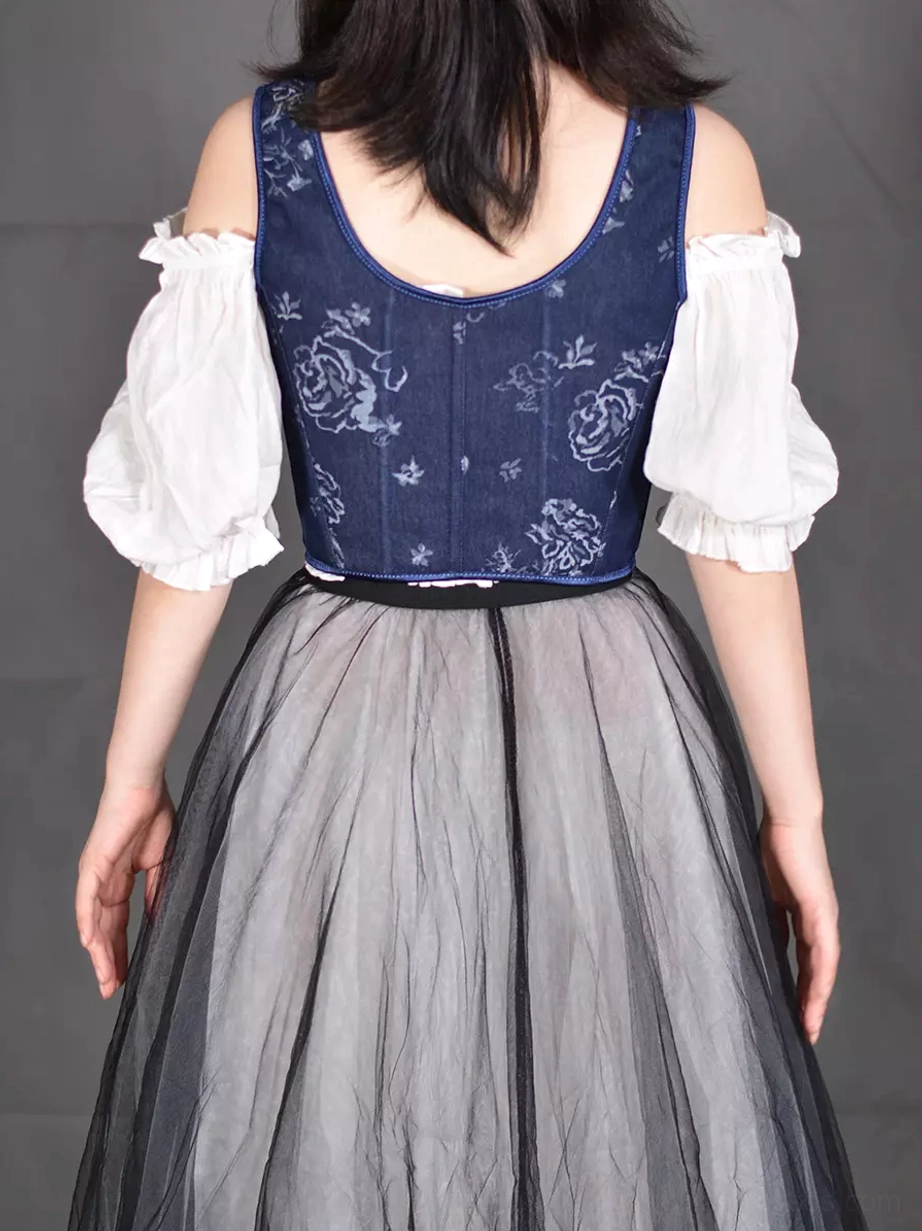 Navy floral corset bustier back view displaying square neckline, all-over rose floral print, and wavy hem with layered tulle midi skirt