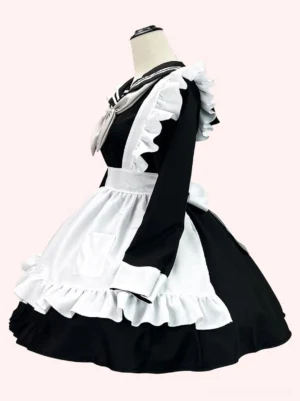 Navy maid Lolita dress side profile showing long polyester sleeves, ruffled shoulder detail, functional apron pocket, and elegant dress silhouette