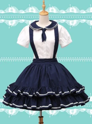 Navy sailor lolita suspender dress with lace collar front view on dress form, showcasing cross-back suspenders and double-ruffled skirt hem