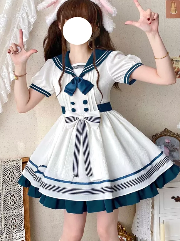 Navy sailor collar sweet lolita dress front half-body view with puff sleeves white base and navy blue trims front bows detail