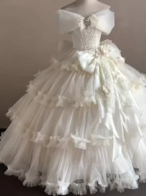 Off-shoulder Classic Lolita wedding dress with rhinestone bow and embroidered lace bodice front view on mannequin