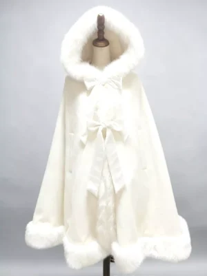 Off-white hooded wool cloak with fluffy faux fur trim and elegant satin bow, displayed on dress form