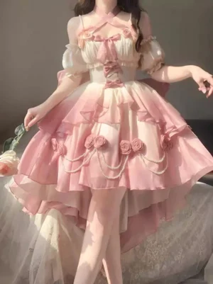 Ombre pink to white sweet lolita dress with puff sleeves and rose pearl chain decorations front three-quarter view