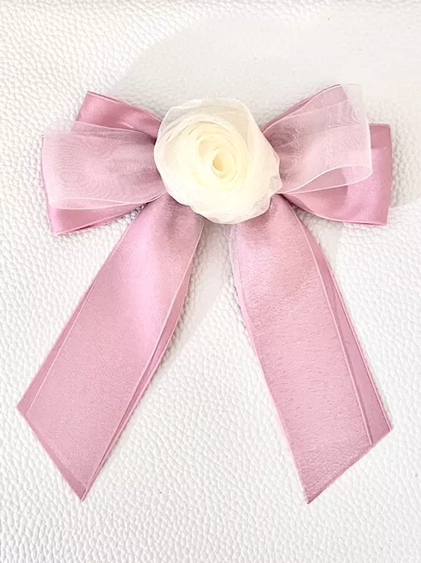 Nine-color organza bow hair clip collection display featuring all available sweet lolita colorways with cream rose embellishment for versatile coordinate styling