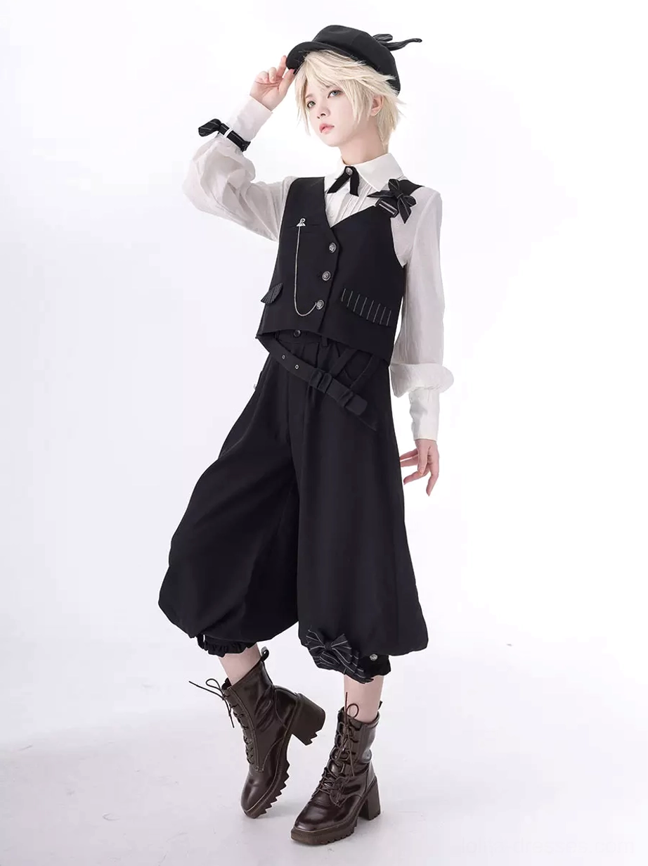 Ouji blouse worn with waistcoat left side view showing gothic formal outfit styling with chain vest decorations