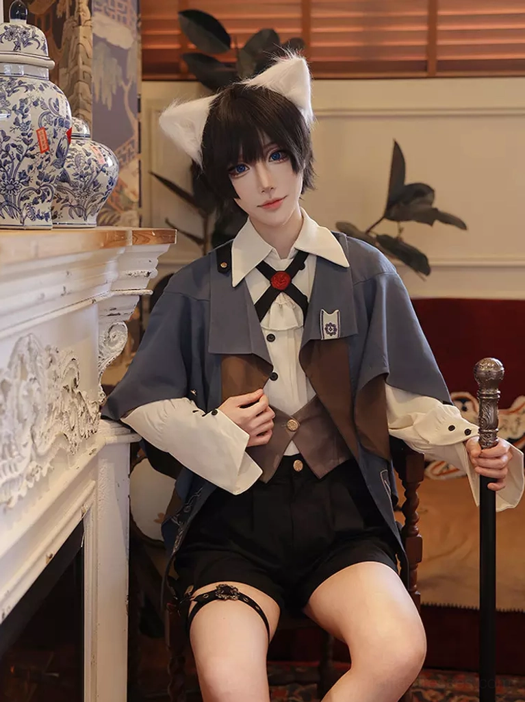 Ouji lolita formal suit back view showcasing cape construction and overall silhouette of the complete gentleman ensemble