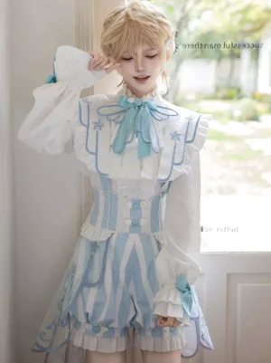 Ouji lolita pastel blue set medium shot showing star embroidery detail on chest panel, stand collar bow, and structured corset waist design