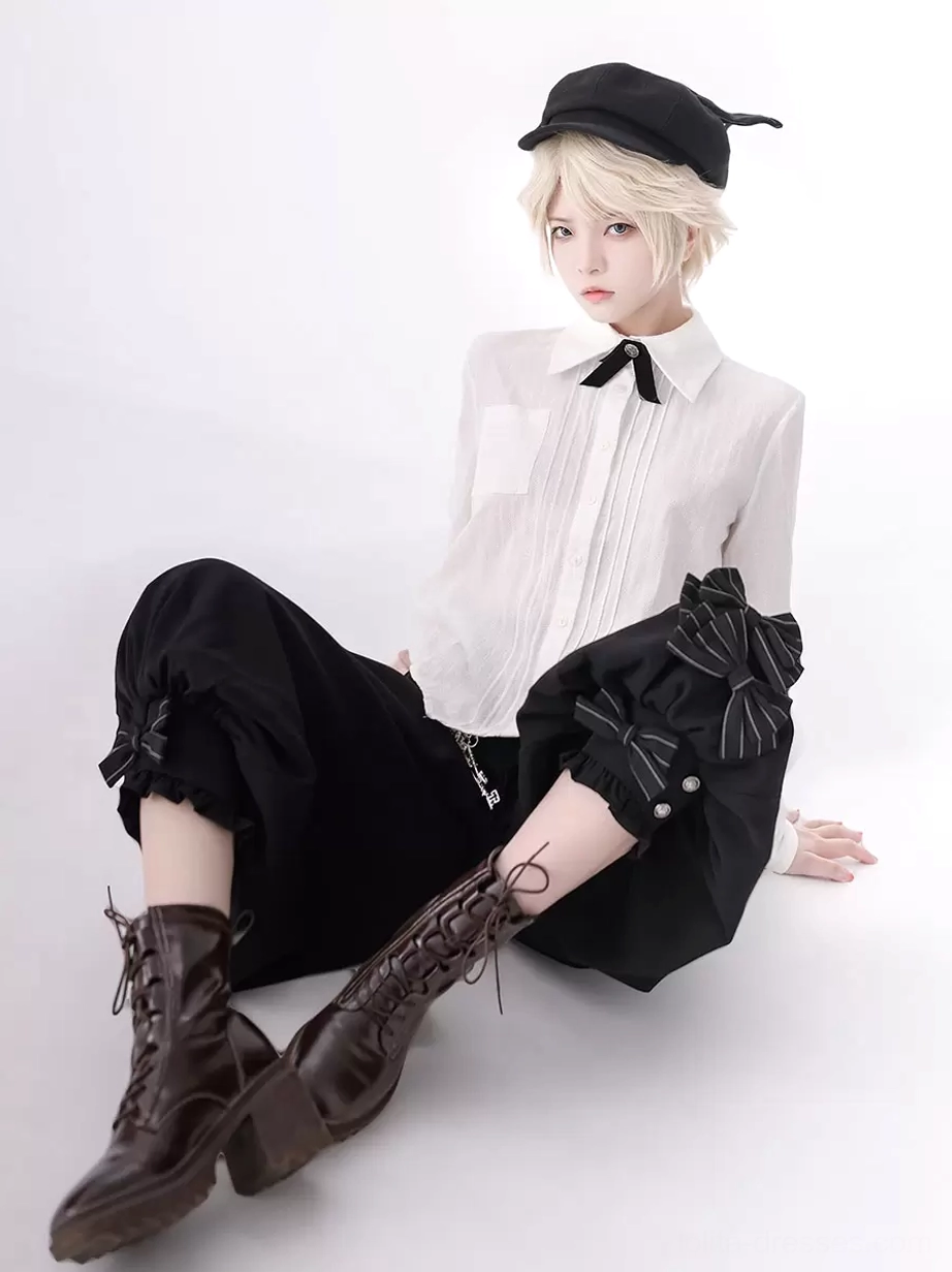 Sitting pose Ouji outfit ruffled cropped bloomers side bows brown lace-up boots low-angle shot