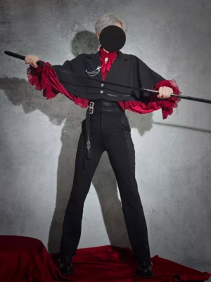 Ouji gothic lolita outfit with cape blazer spread open showing ruffle blouse red black ensemble with silver brooch