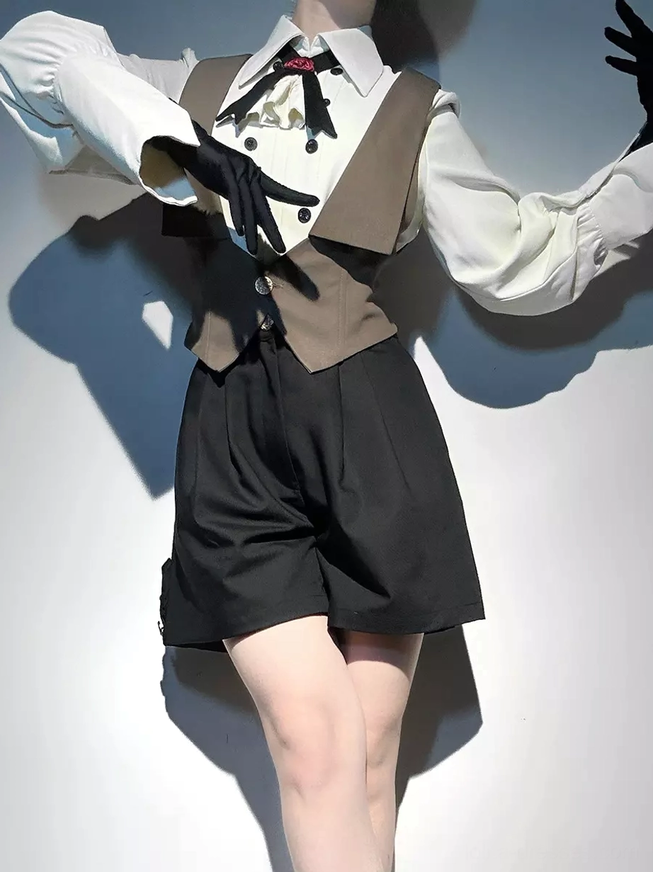 Side dynamic pose of dark navy ouji lolita suit showing loose long formal shirt sleeves, formal necktie, and cropped outfit composition