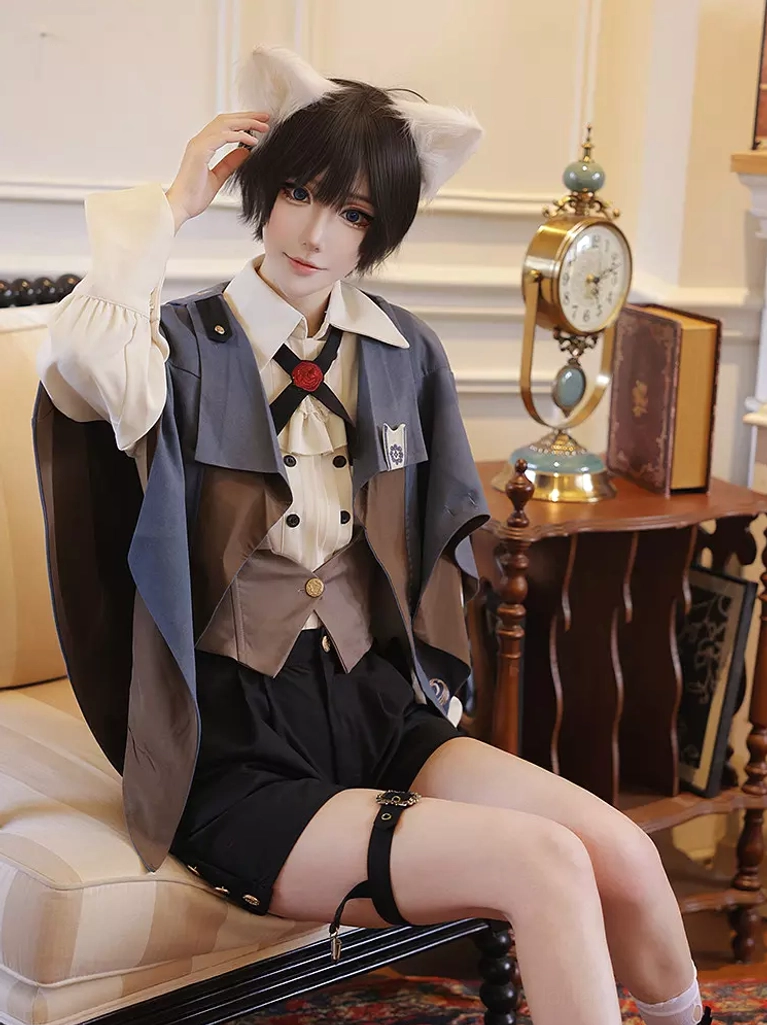 Ouji lolita waistcoat and layering detail showing brown vest coordination with formal white shirt and embroidered top pieces