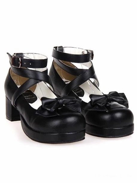 Pair of black lolita bow heels direct frontal view featuring cross ankle straps with buckles, round block heel, and classic lolita aesthetic