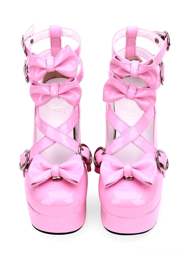 Pair of pink Lolita high-heel platform pumps direct front view on white background, triple bow accents, crisscross ankle straps, patent pink PU leather with glossy finish