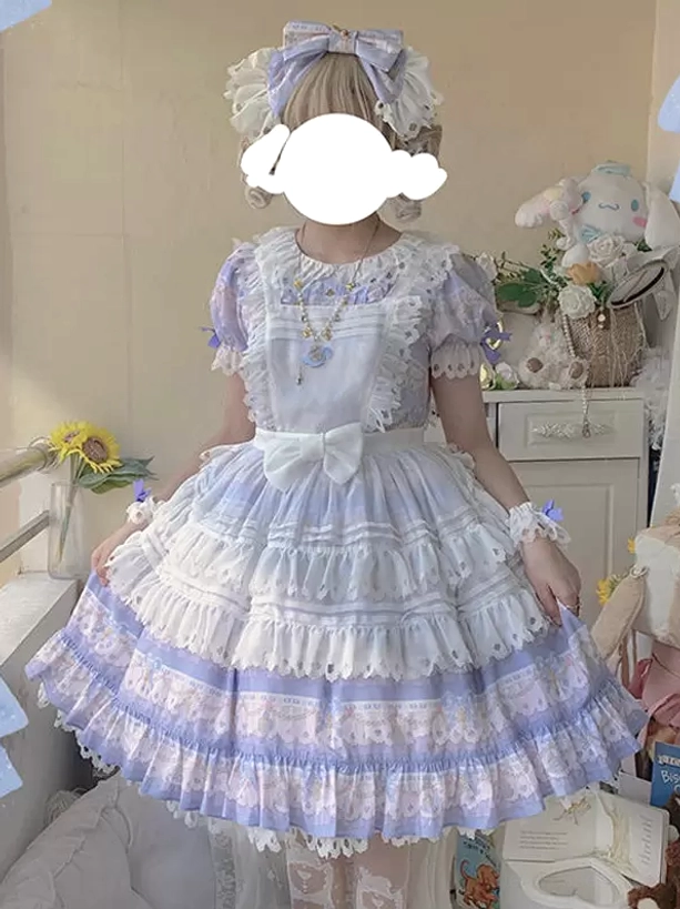 pastel blue sweet lolita dress back view with layered lace ruffles and white bow detail, displaying the characteristic bell-shaped silhouette and multi-layer construction of authentic sweet lolita fashion