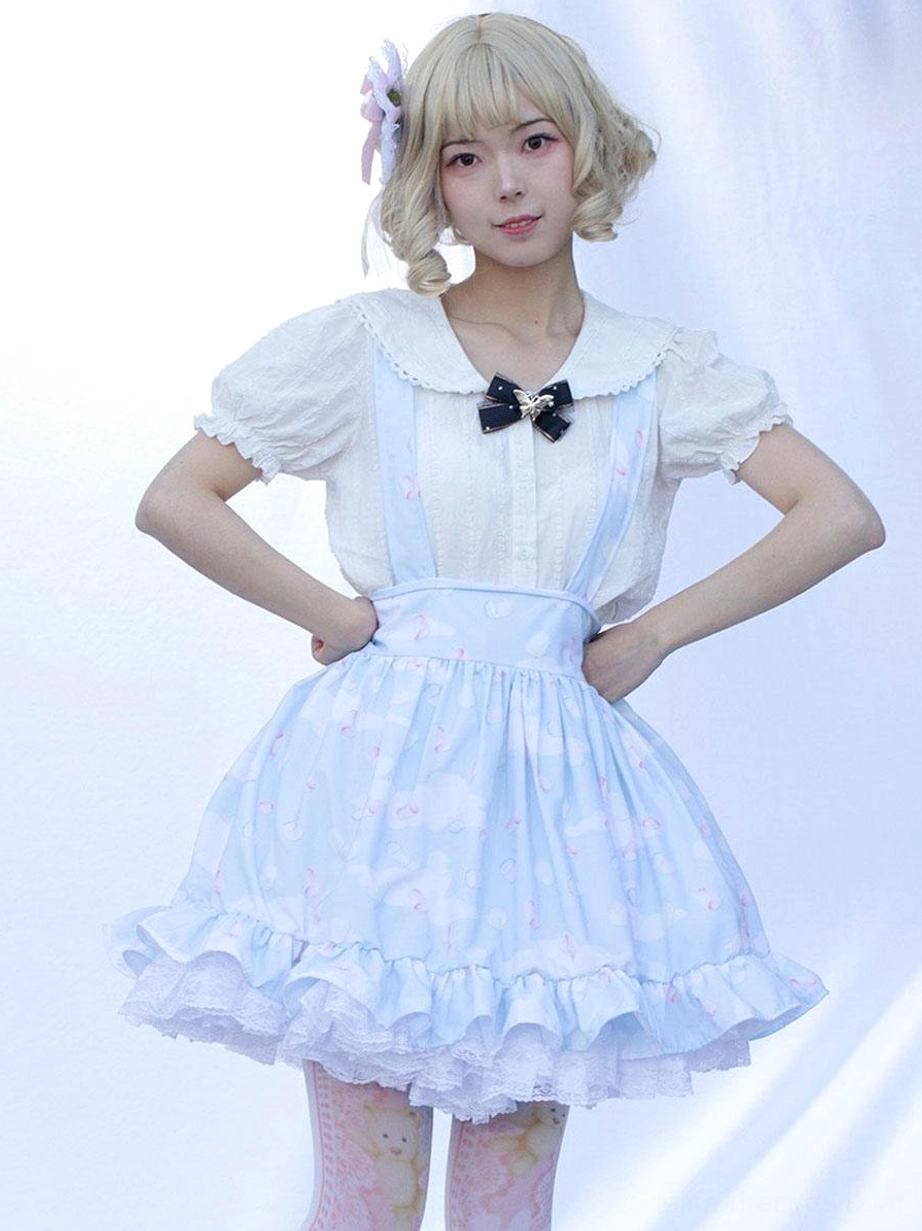Front full-body view light sky blue pastoral lolita skirt with floral print pattern, black bow neck accessory, ruffled lace hem detail, plain background studio photography