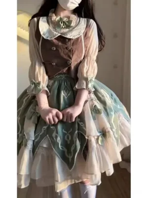 Pastoral sweet lolita three-piece set featuring sage green embroidered layered skirt with ruffles, cream ruffled three-quarter sleeve blouse, and rich brown velvet waistcoat with decorative metal buttons, front view on model showing complete fairy dress ensemble