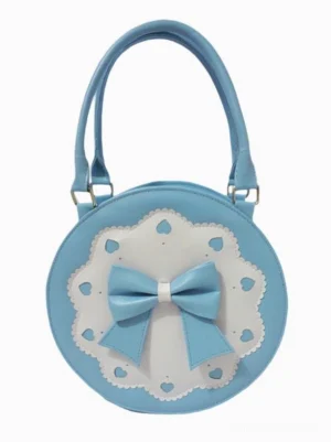 Periwinkle blue round lolita handbag featuring heart-cut lace design and coordinating blue bow accent front display