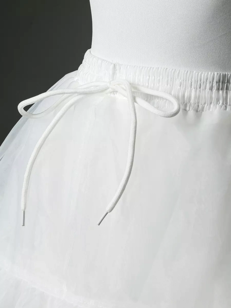 Petticoat elastic waistband close-up showing white drawstring tie and soft sheer tulle material texture detail