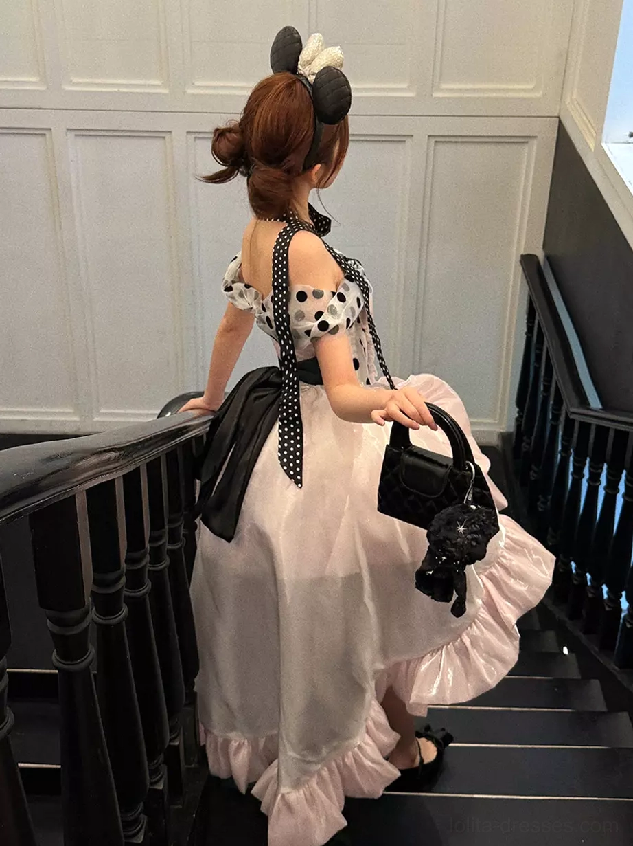 Pink ballet lolita princess dress with corset construction polka dot pattern and voluminous ruffled skirt classic rococo design