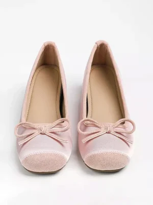 Pink classic ballet lolita pumps with bow detail and suede square toe cap front view - elegant wedge heel shoes