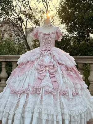 Pink Classic Lolita ball gown full front view with oversized satin bows, short puff sleeves, lace trims, pearl chain details, and layered tulle skirt - vintage romantic style