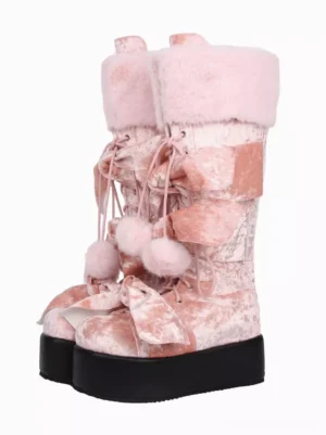 Front paired display of pink crushed velvet gothic lolita platform boots with fuzzy fur collar, pom-pom and bow decorations, black platform sole, knee-high lolita shoes on white background