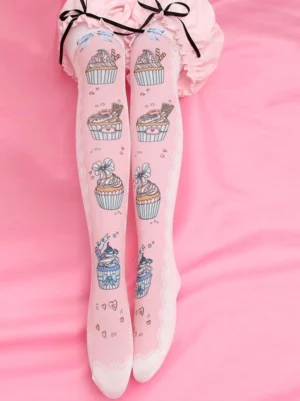 Pink velvet printed Lolita thigh high socks with cupcake design and heart accents worn with pink frilled skirt overhead view