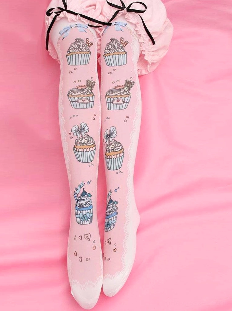 Pink velvet printed Lolita thigh high socks with cupcake design and heart accents worn with pink frilled skirt overhead view