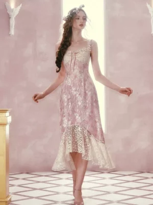 Pink floral lolita dress front view square neckline bow detail asymmetrical midi length vintage studio setting