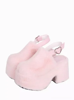Pink fuzzy chunky heel sweet lolita sandals with heart-shaped metal buckle ankle strap, front three-quarter view showcasing round toe and plush faux fur upper