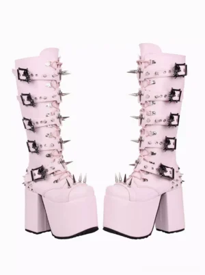 Pink gothic punk platform boots side angle view showing thick platform sole skull-shaped buckle straps spike ornaments