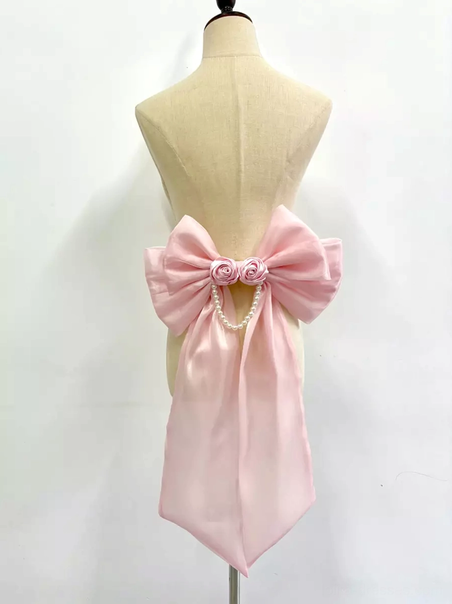 Pink sweet Lolita bow train accessory back view display model with satin bow and floral rose decoration