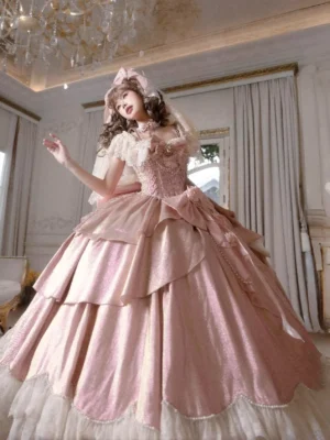 Rear three-quarter view of pink lolita bridal gown showing tiered layered satin skirt, off-shoulder ruffled collar, and elegant princess silhouette