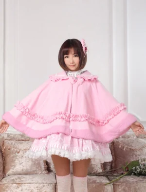 Full front view of pink ruffled lolita cape cloak paired with white lace skirt ensemble sweet lolita coordinate