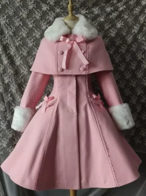 Pink lolita wool coat with white fur collar and double-breasted front design, displayed on dress form with decorative pink bow and flared silhouette