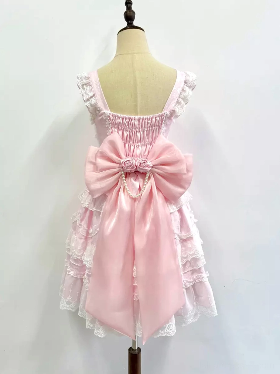 Pink Lolita dress coordinate with matching bow tail accessory back view lace ruffled trim detail