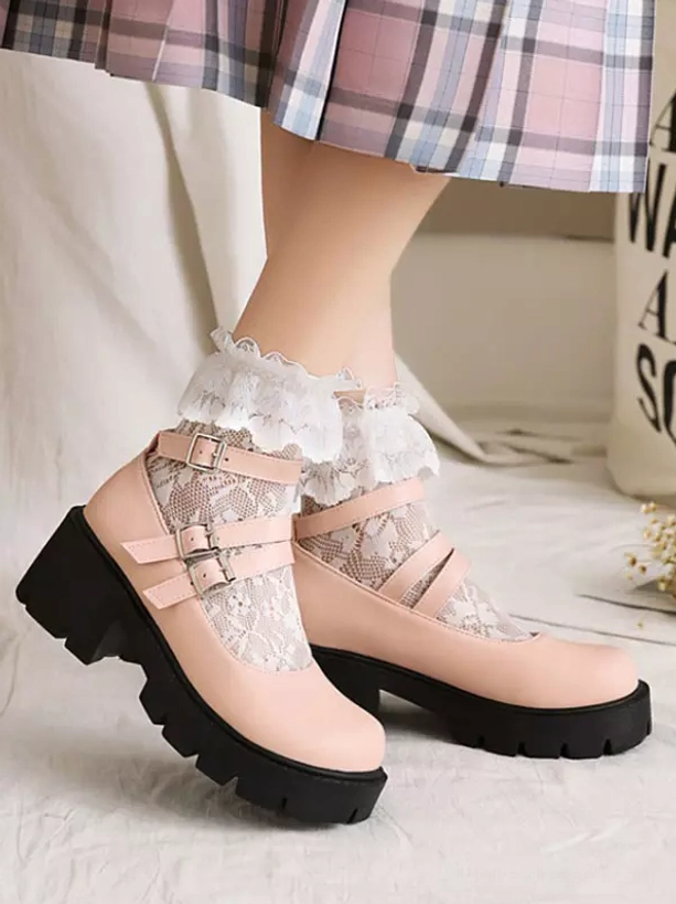 Pink lolita Mary Jane platform shoes side view with plaid skirt styling showing lace panel upper and adjustable straps