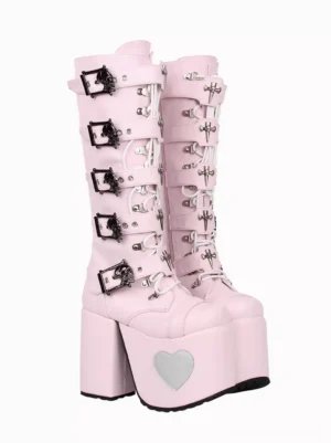 Pair of pink Lolita boots with decorative metal buckles and front lace-up design detail Gothic fashion footwear