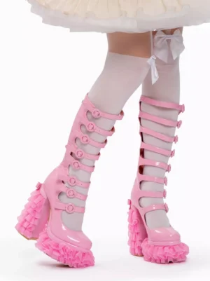 Pink patent leather lolita platform boots side view chunky heel block heel buckle straps bow white stockings