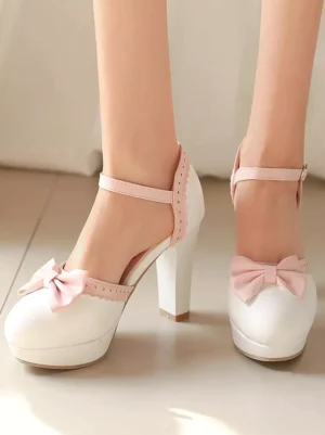 Pink Lolita platform heels with adjustable buckle strap and bow decoration dual on-foot view