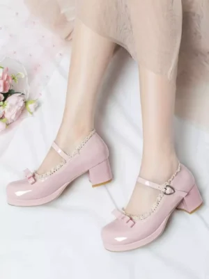 Pink lolita chunky heel pumps side view with tiny front bow and block heel white background with small flowers detail shot