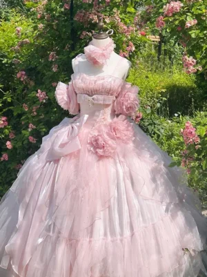 Pink lolita ball gown off-shoulder neckline detail glitter tulle fabric waist bow flower accessory rose garden setting