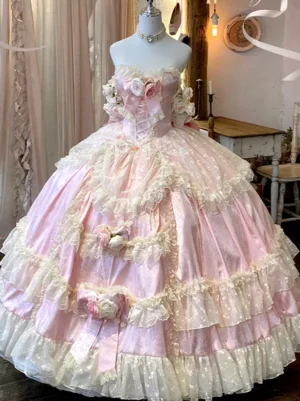 Formal pink lolita gown with layered lace-trimmed skirt corset bodice floral appliques mannequin display