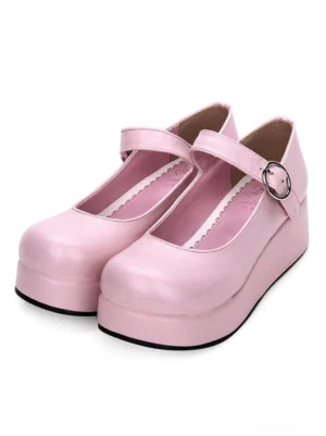 Pearlescent pink Mary Jane platform Lolita pumps with scalloped inner lining and silver buckle strap front three-quarter pair view classic style