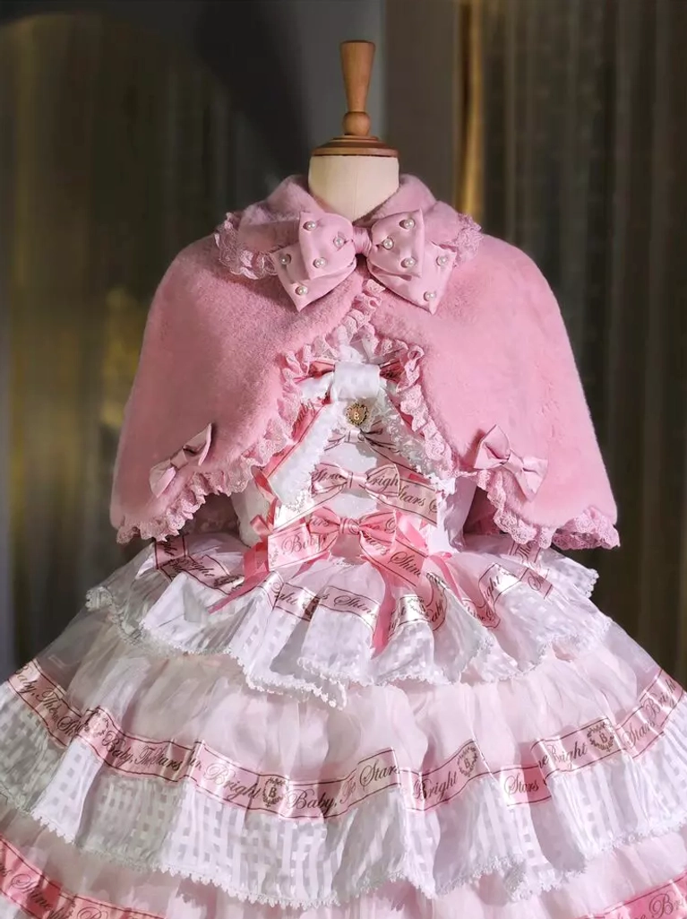 Pink plush lolita bunny ear cape with matching pink bow collar and scalloped hem edge, styled on dress form with coordinating pink lolita dress